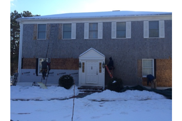 Rot repair, new windows, siding and trim
