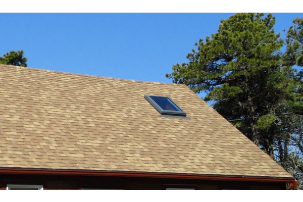Cedar shingle roof with new skylight